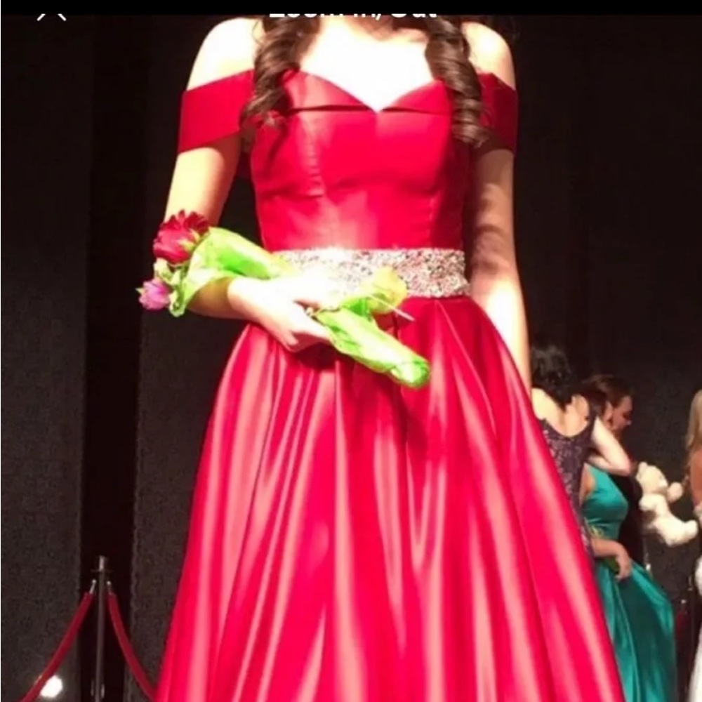 Formal dress for pageant or prom.  Color is red and in good condition.  Size 0